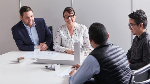 A&L Windows team members chatting with clients