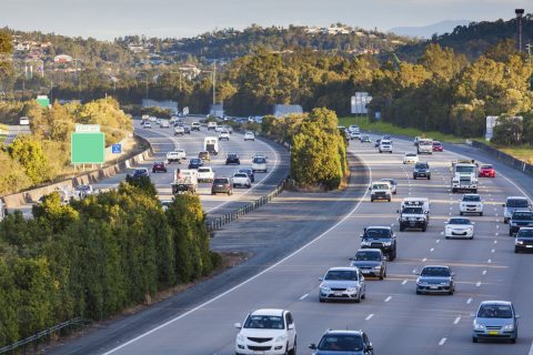 a wide view of many cars on a highway